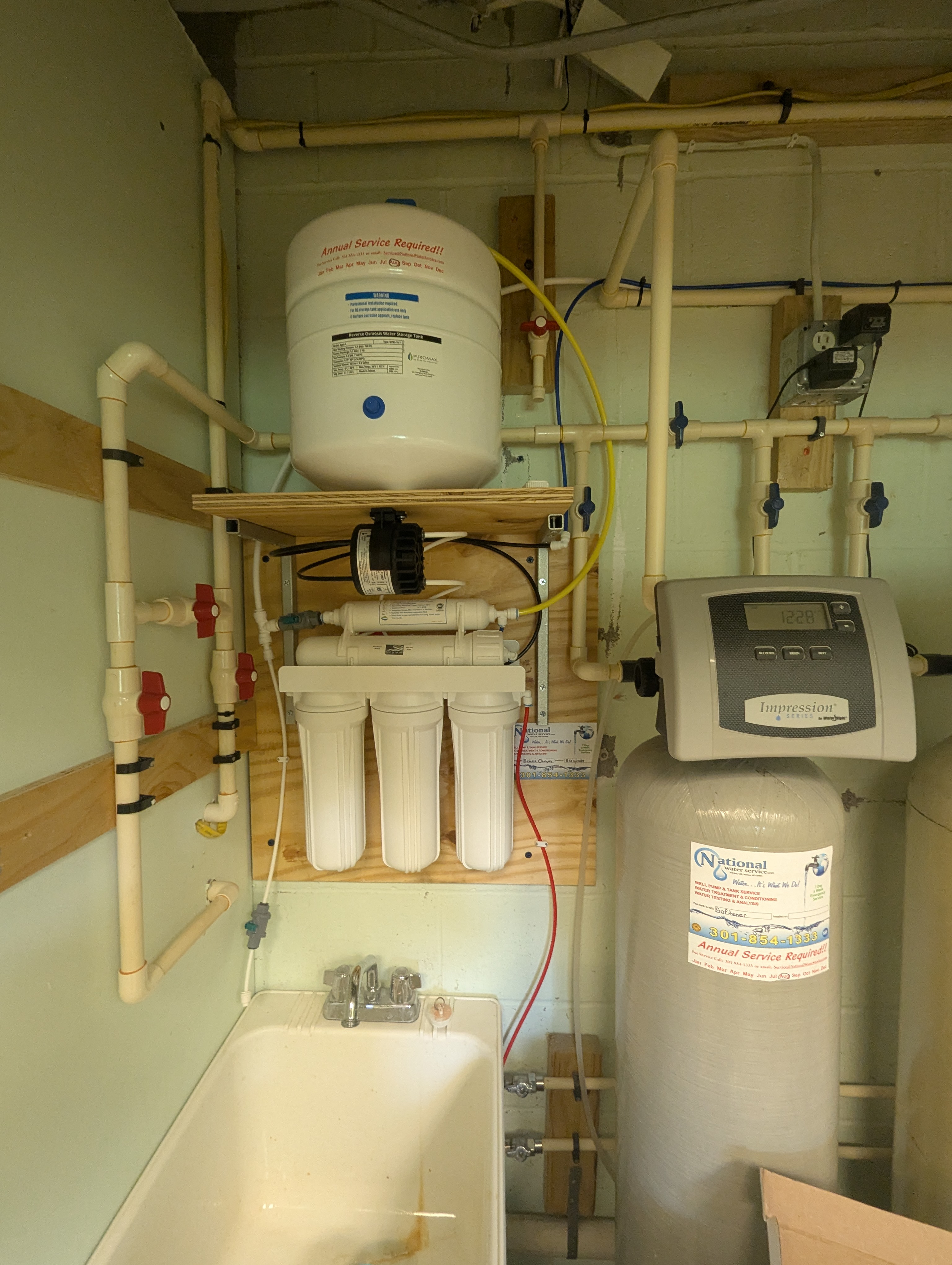 Reverse osmosis system with pre-filtration and storage tank