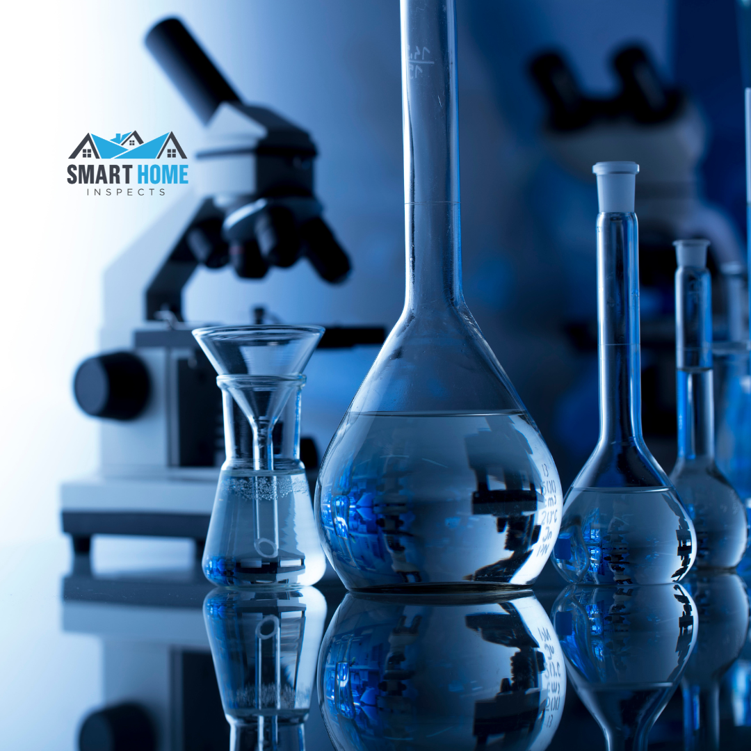Professional water testing laboratory with microscope and glassware showing Smart Home Inspects' advanced testing capabilities